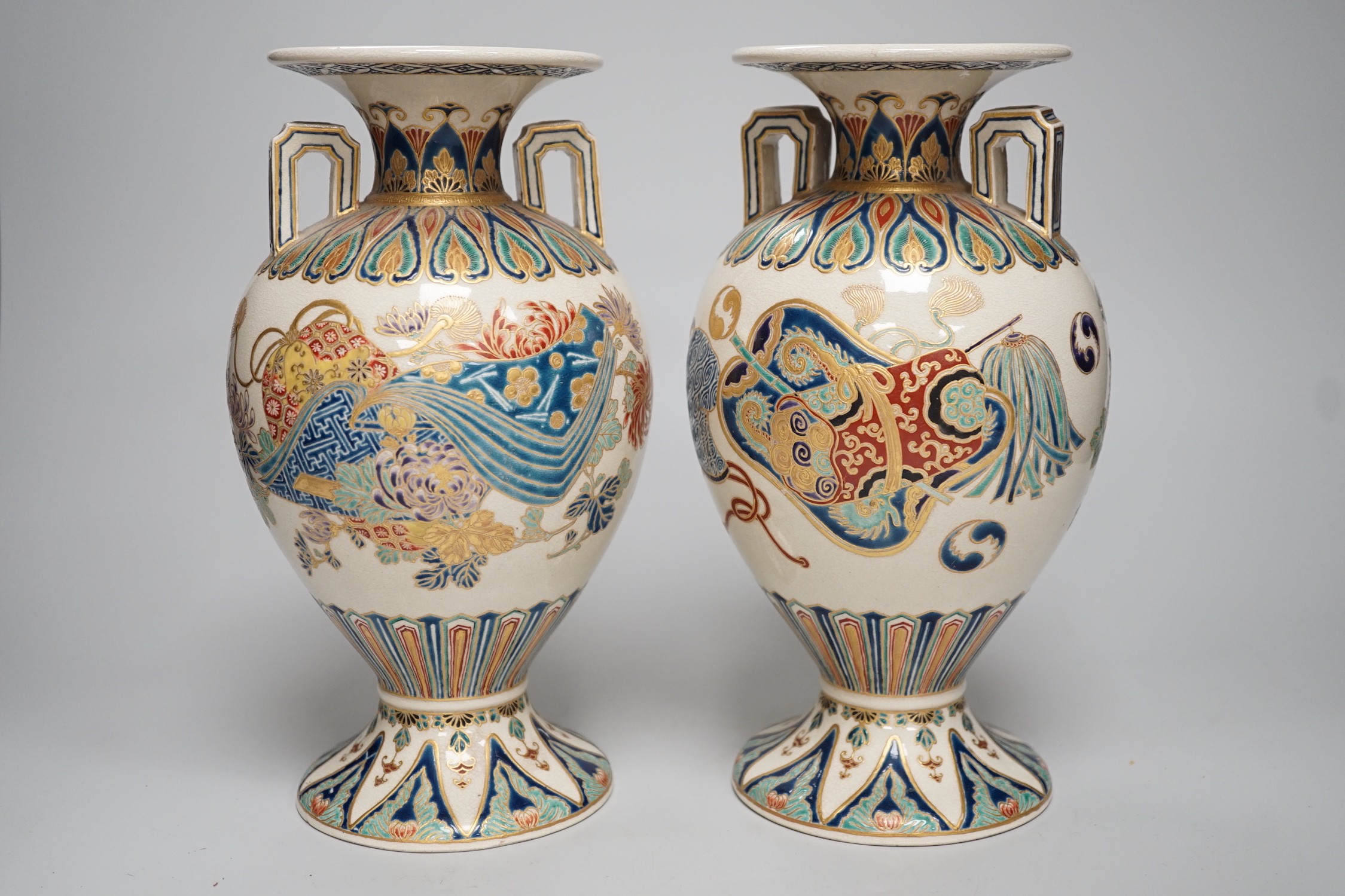 A pair of Japanese Satsuma gosu blue vases, Meiji period, signed to base. 24cm